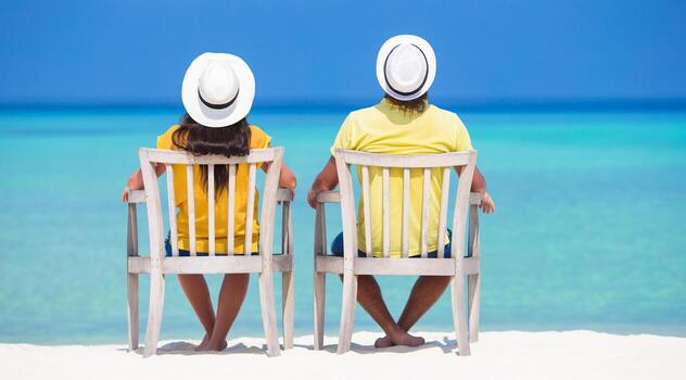 Couple relaxing at the beach photo